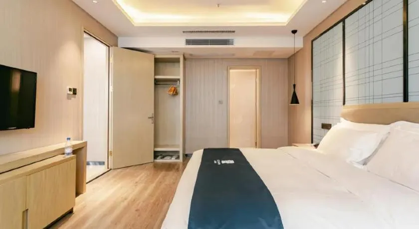 Bed in Echarm Hotel Guiyang Longdongbao International Airport Outlets