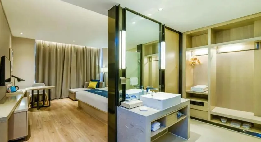 Bed in Echarm Hotel Guiyang Longdongbao International Airport Outlets