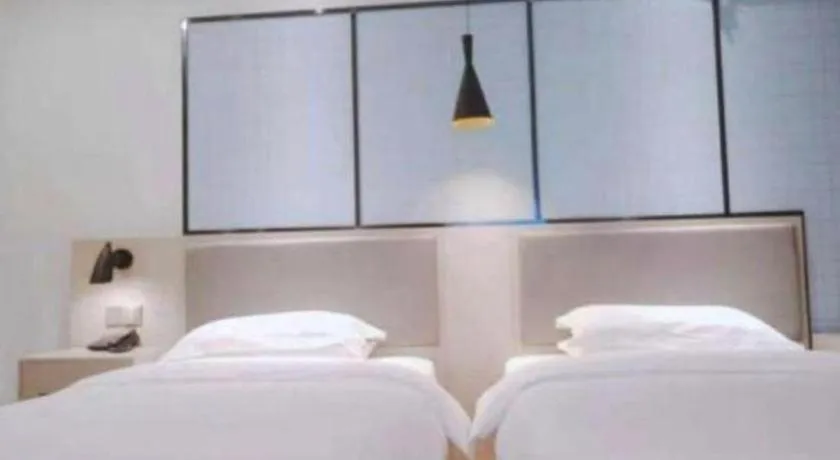 Bed in Borrman Hotel Hefei Guogou Plaza Sanli'an Metro Station