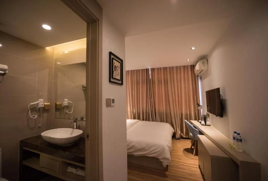 Bed in Borrman Hotel Hefei Guogou Plaza Sanli'an Metro Station