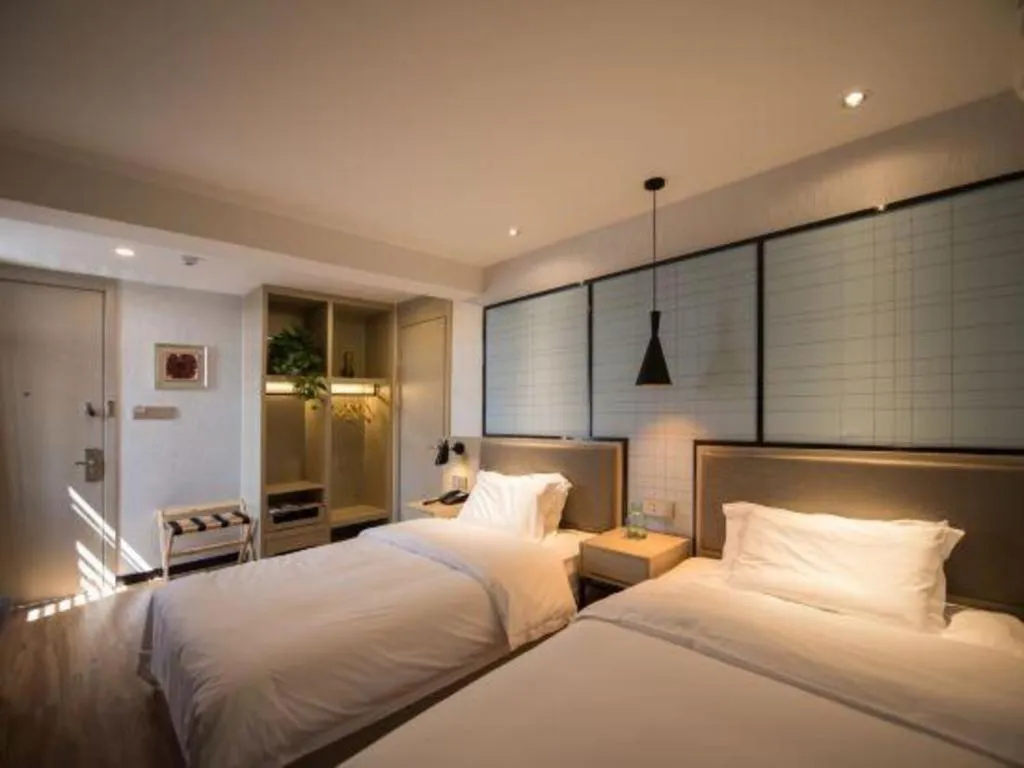 Bed in Borrman Hotel Hefei Guogou Plaza Sanli'an Metro Station