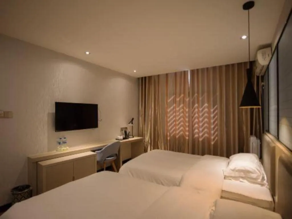 Bed in Borrman Hotel Hefei Guogou Plaza Sanli'an Metro Station