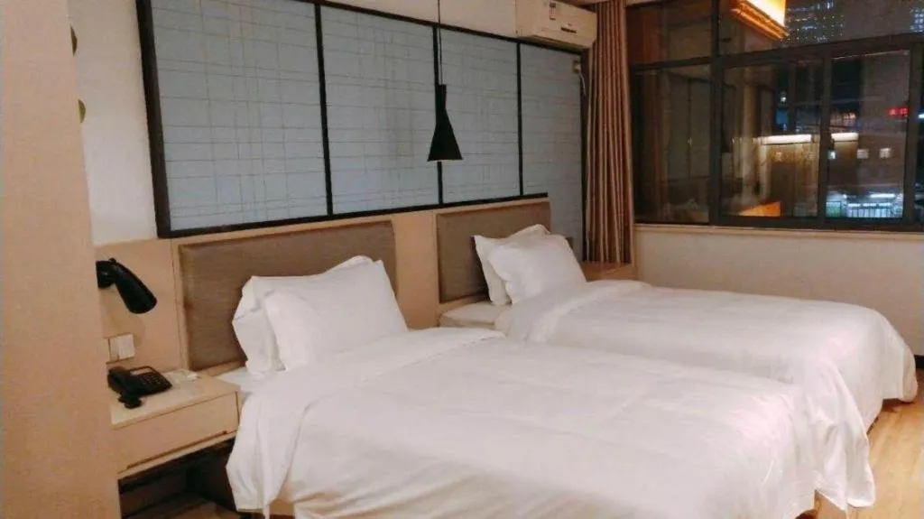 Bed in Borrman Hotel Hefei Guogou Plaza Sanli'an Metro Station