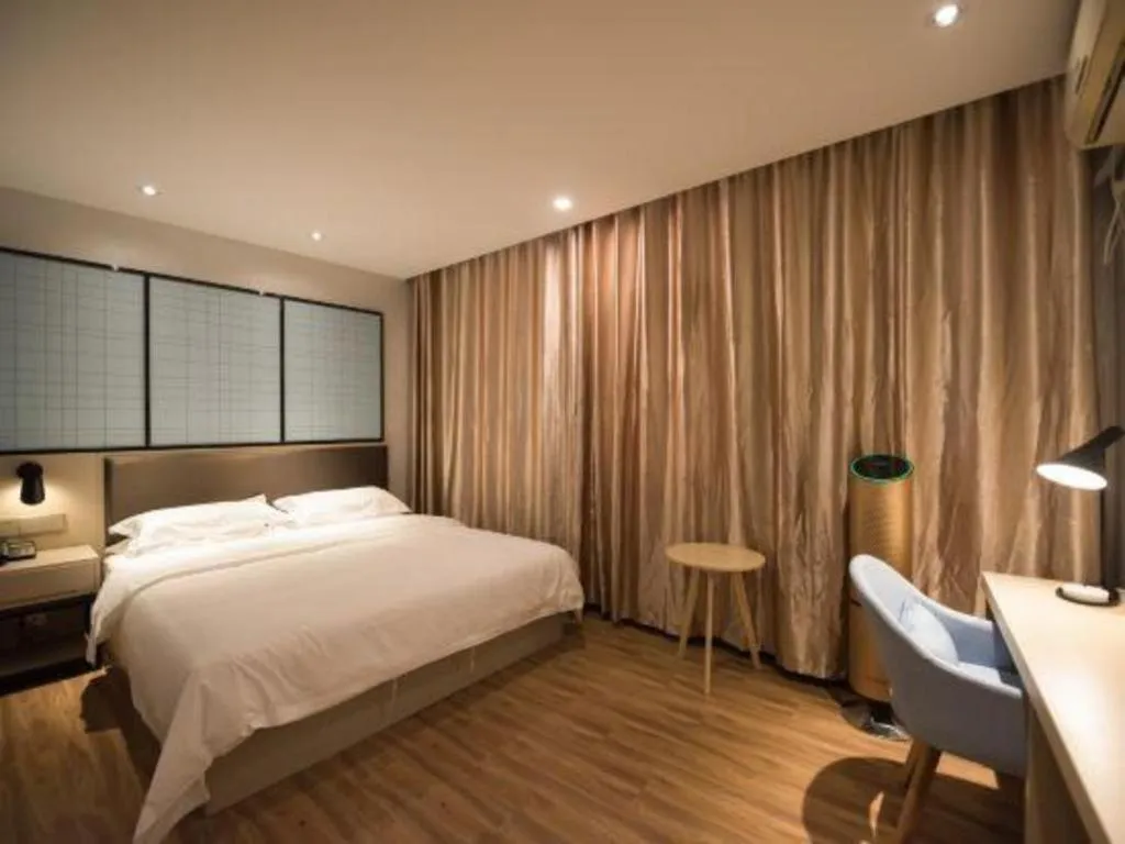 Bed in Borrman Hotel Hefei Guogou Plaza Sanli'an Metro Station