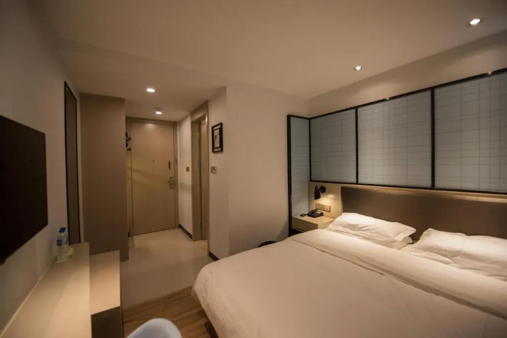 Bed in Borrman Hotel Hefei Guogou Plaza Sanli'an Metro Station