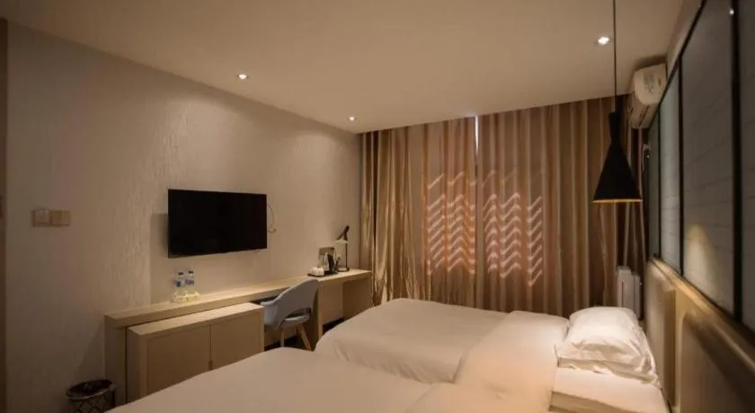 Bed in Borrman Hotel Hefei Guogou Plaza Sanli'an Metro Station