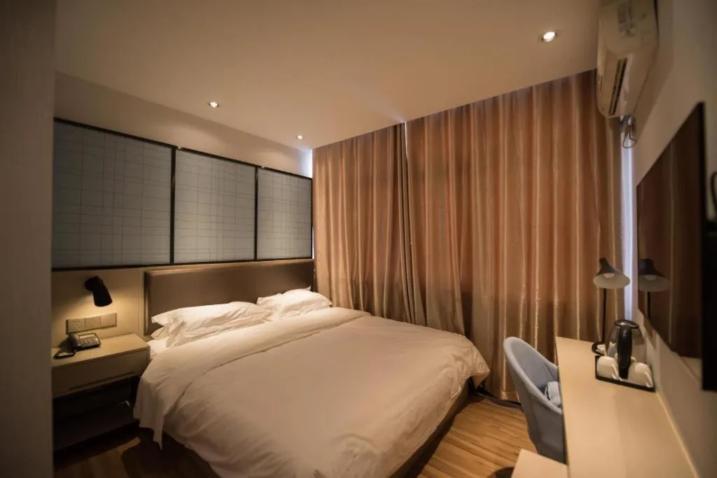 Bed in Borrman Hotel Hefei Guogou Plaza Sanli'an Metro Station