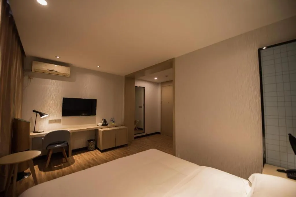 Bed in Borrman Hotel Hefei Guogou Plaza Sanli'an Metro Station