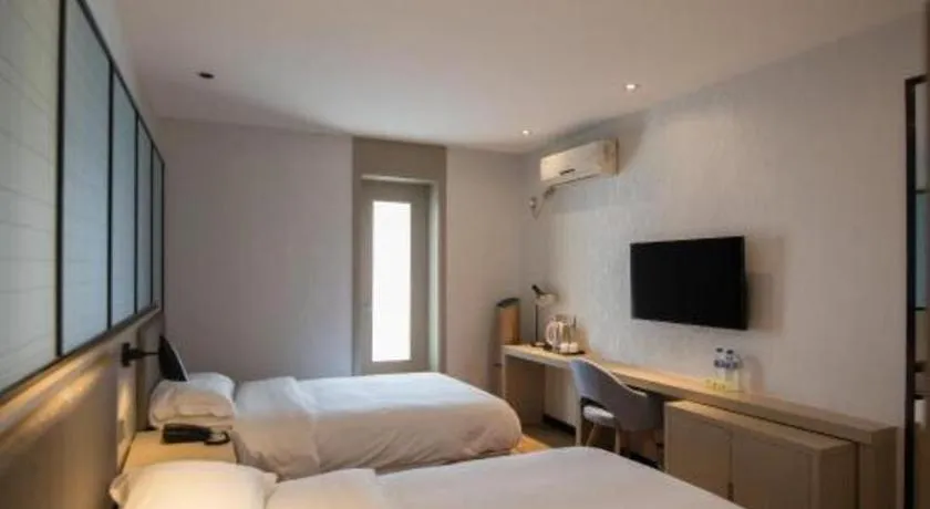 Bed in Borrman Hotel Hefei Guogou Plaza Sanli'an Metro Station