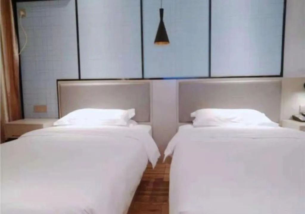 Bed in Borrman Hotel Hefei Guogou Plaza Sanli'an Metro Station