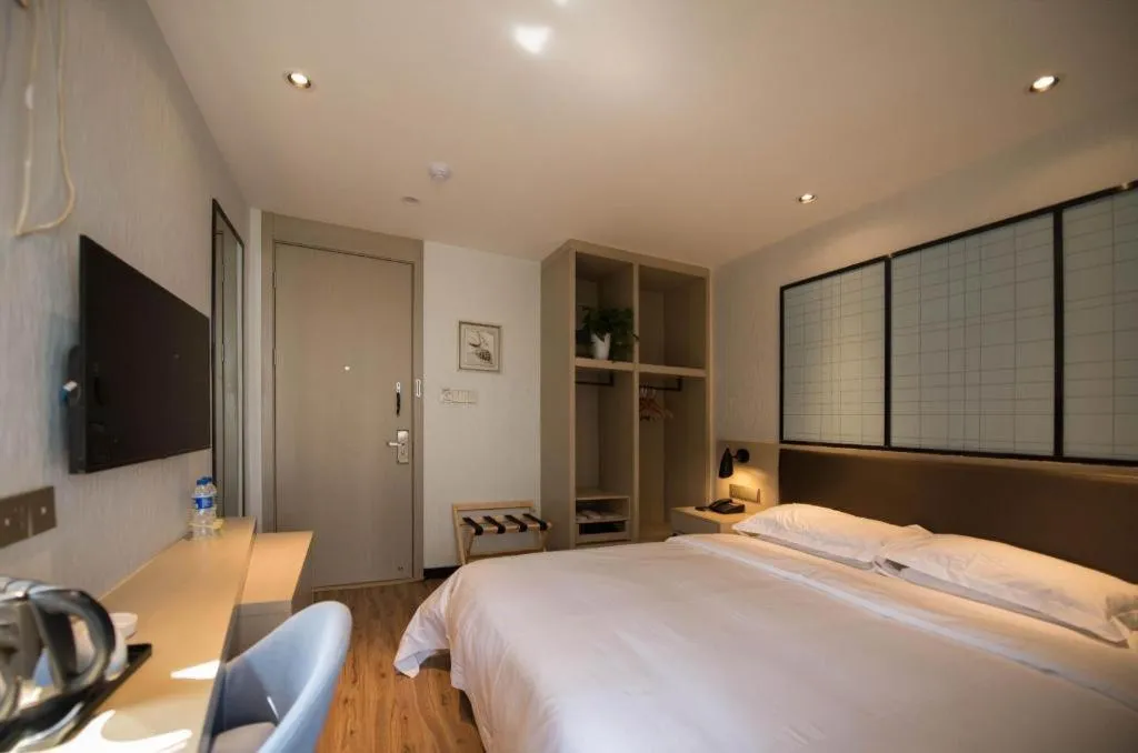 Bed in Borrman Hotel Hefei Guogou Plaza Sanli'an Metro Station