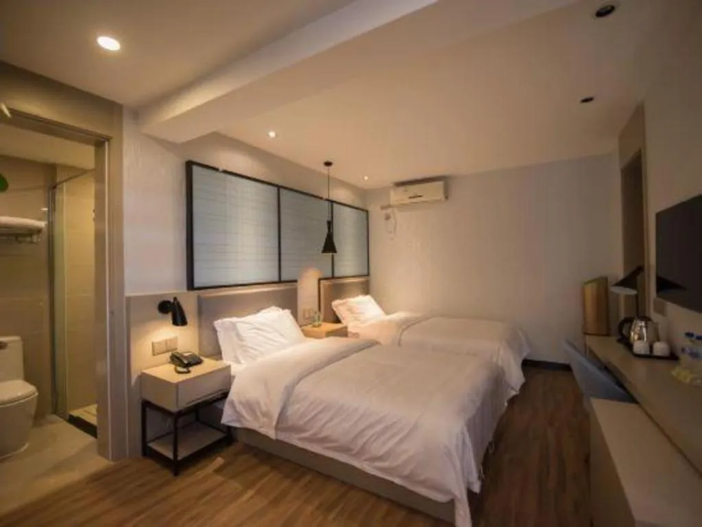 Bed in Borrman Hotel Hefei Guogou Plaza Sanli'an Metro Station