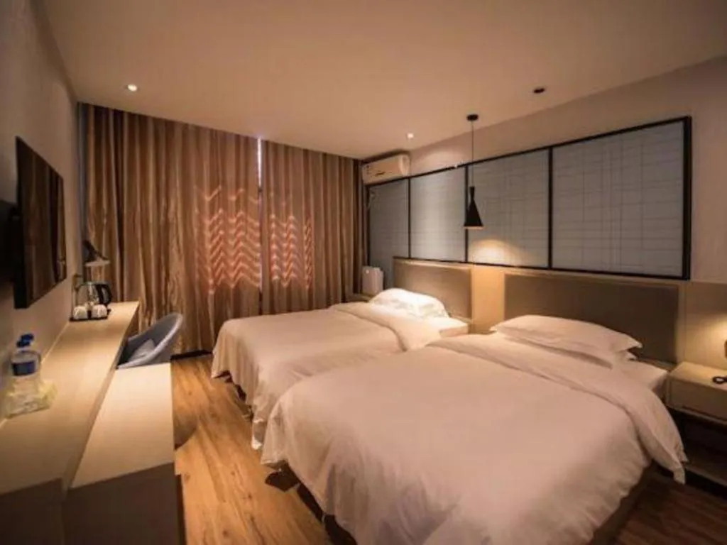 Bed in Borrman Hotel Hefei Guogou Plaza Sanli'an Metro Station