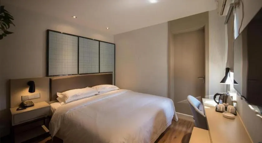 Bed in Borrman Hotel Hefei Guogou Plaza Sanli'an Metro Station