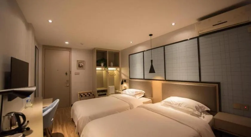 Bed in Borrman Hotel Hefei Guogou Plaza Sanli'an Metro Station