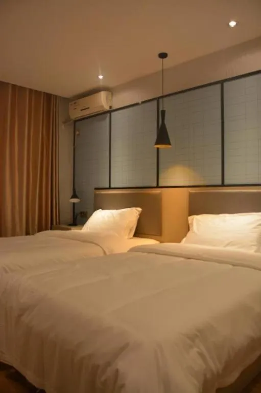 Bed in Borrman Hotel Hefei Guogou Plaza Sanli'an Metro Station