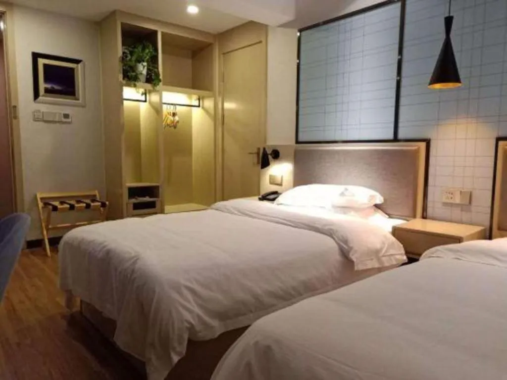 Bed in Borrman Hotel Hefei Guogou Plaza Sanli'an Metro Station