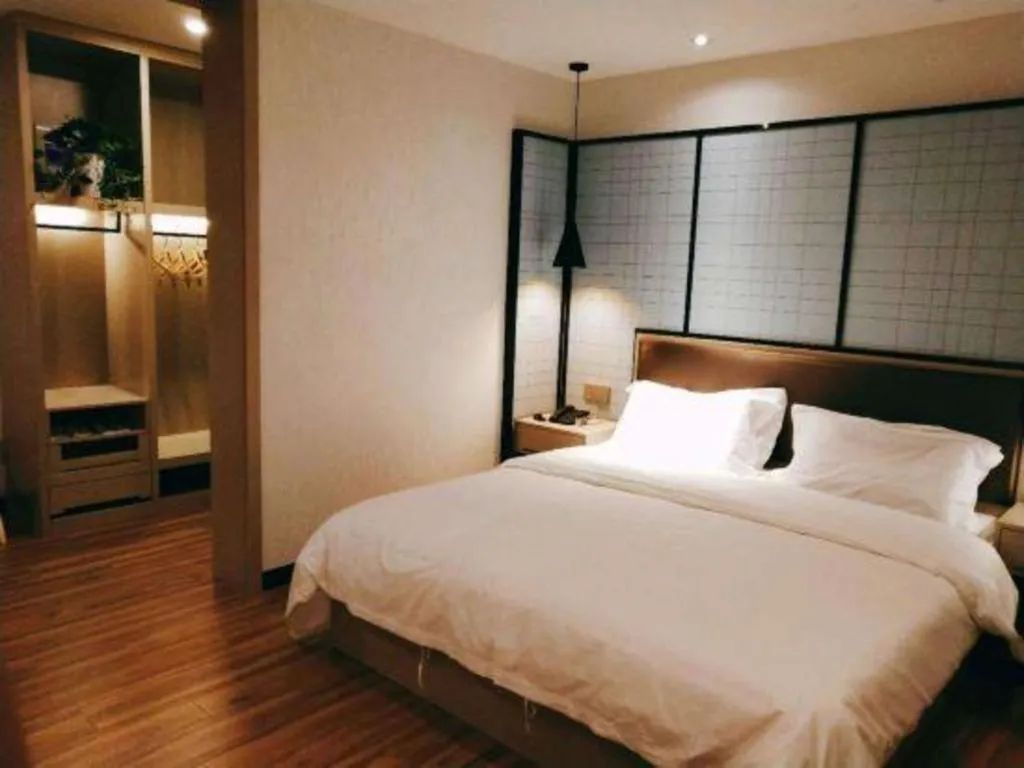 Bed in Borrman Hotel Hefei Guogou Plaza Sanli'an Metro Station