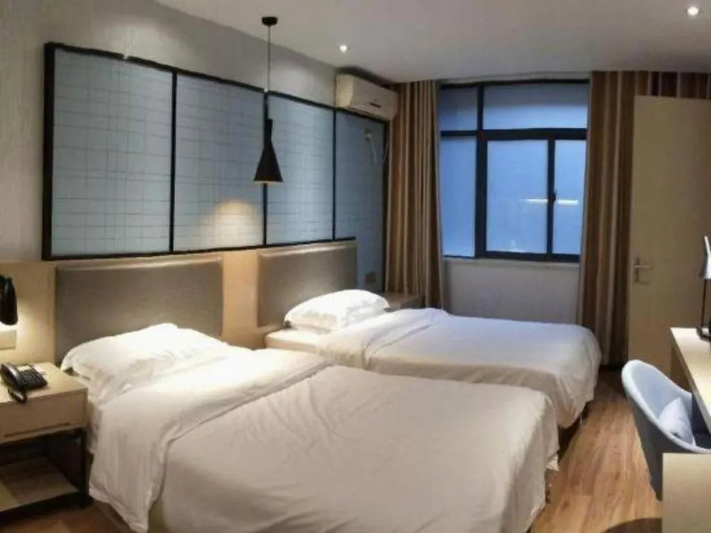 Bed in Borrman Hotel Hefei Guogou Plaza Sanli'an Metro Station