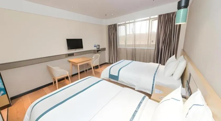 Bed in City Comfort Inn Guangzhou Panyu Qiaonan Aoyuan Plaza