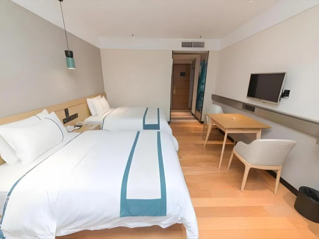 Bed in City Comfort Inn Guangzhou Panyu Qiaonan Aoyuan Plaza