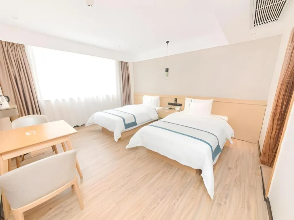 Bed in City Comfort Inn Guangzhou Panyu Qiaonan Aoyuan Plaza