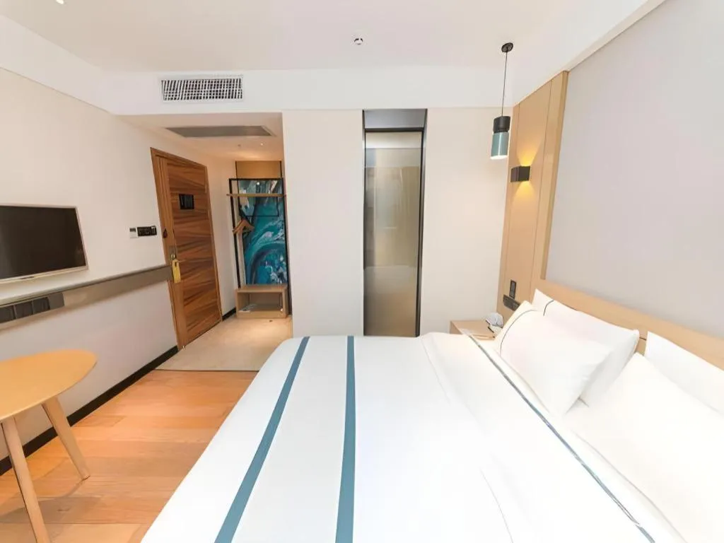 Bed in City Comfort Inn Guangzhou Panyu Qiaonan Aoyuan Plaza