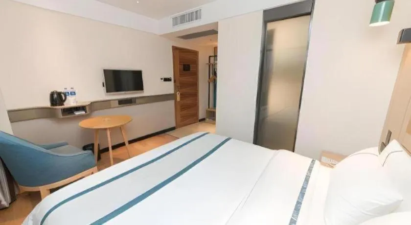 Bed in City Comfort Inn Guangzhou Panyu Qiaonan Aoyuan Plaza