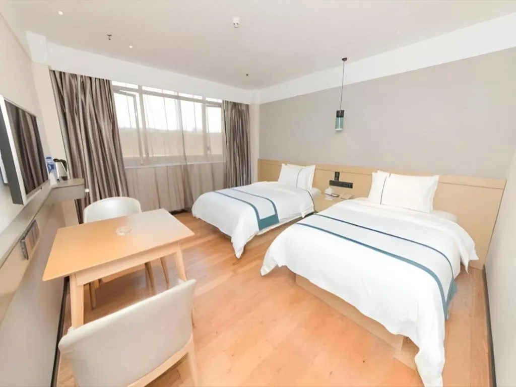 Bed in City Comfort Inn Guangzhou Panyu Qiaonan Aoyuan Plaza