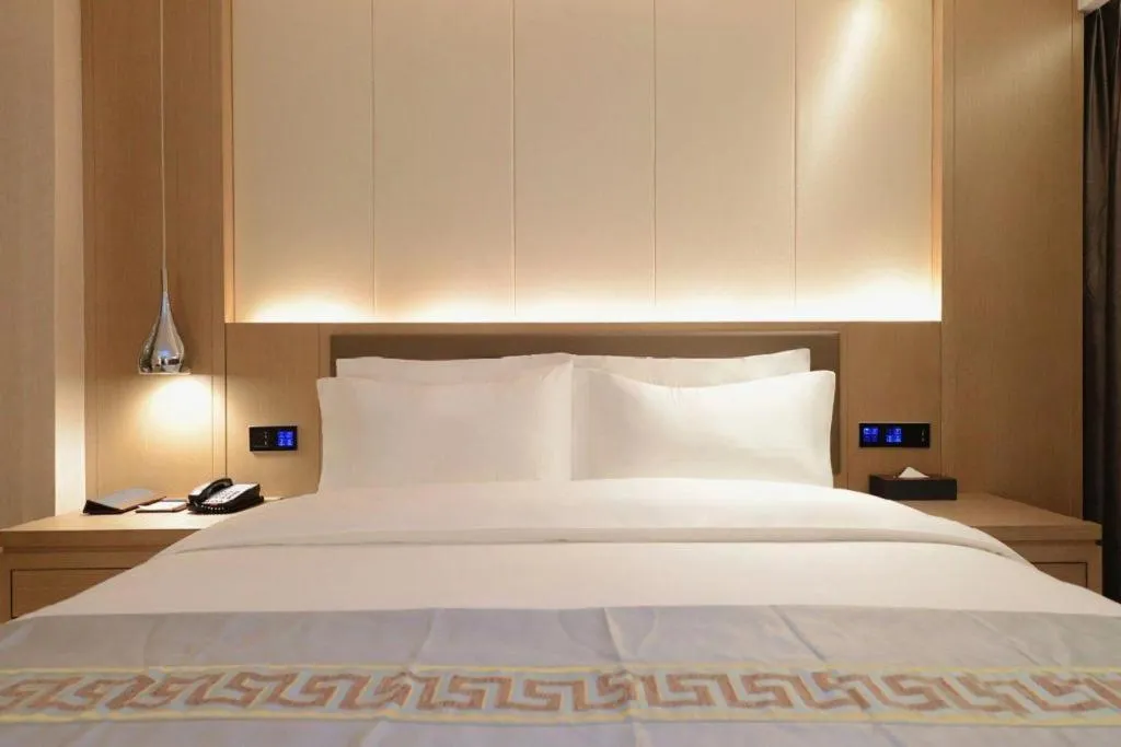 Bed in Borrman Hotel Guiyang Guanshanhu International Conference Center Metro Station