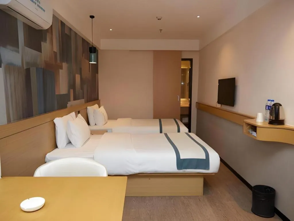 Bed in City Comfort Inn Guangzhou Shisanhang Shangxiajiu Pedestrian Street 1st Branch
