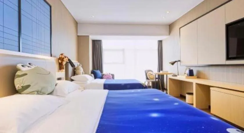 Bed in Echarm Hotel Aegean Shopping Park Zhonghuan Plaza