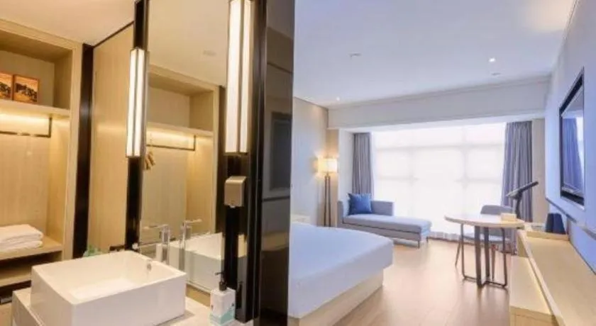 Bed in Echarm Hotel Aegean Shopping Park Zhonghuan Plaza