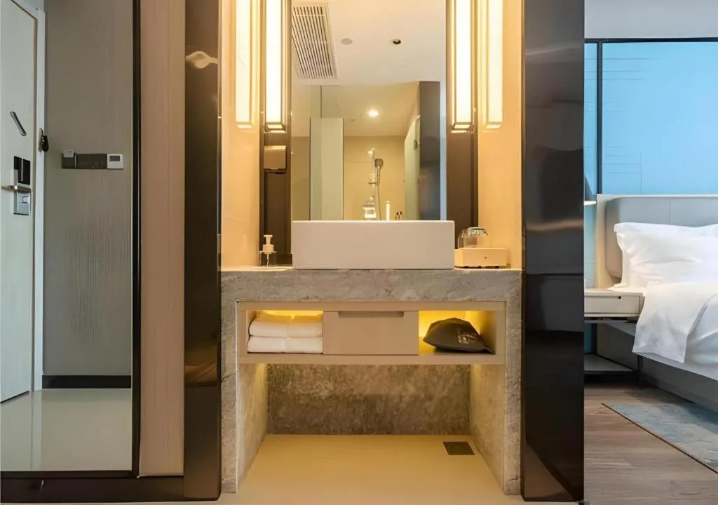 Bed in Echarm Hotel Aegean Shopping Park Zhonghuan Plaza