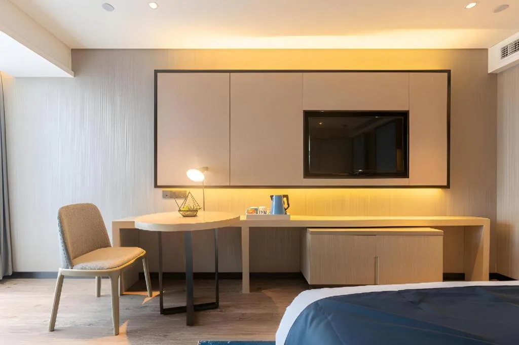 Bed in Echarm Hotel Aegean Shopping Park Zhonghuan Plaza