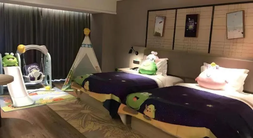 Bed in Echarm Hotel Aegean Shopping Park Zhonghuan Plaza