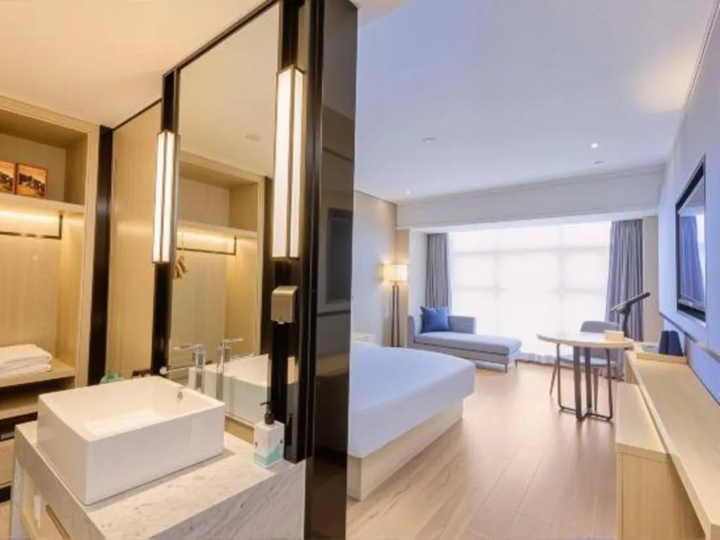 Bed in Echarm Hotel Aegean Shopping Park Zhonghuan Plaza