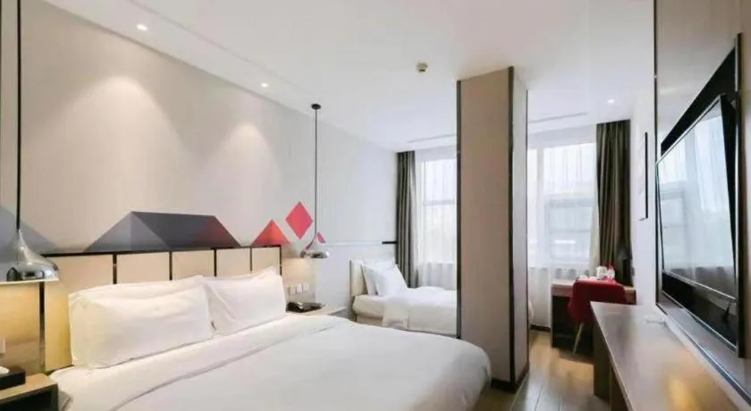 Bed in Borrman Hotel Tai'an Central Hospital Taishan Tianwai Village Hongmen