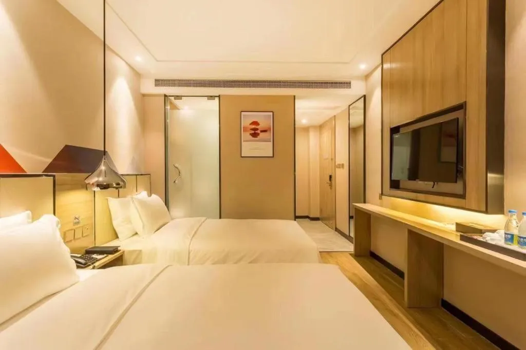 Bed in Borrman Hotel Tai'an Central Hospital Taishan Tianwai Village Hongmen