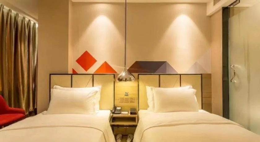 Bed in Borrman Hotel Tai'an Central Hospital Taishan Tianwai Village Hongmen