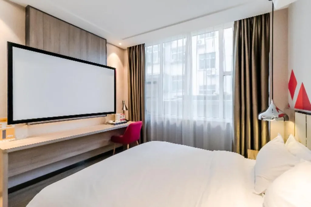 Bed in Borrman Hotel Tai'an Central Hospital Taishan Tianwai Village Hongmen