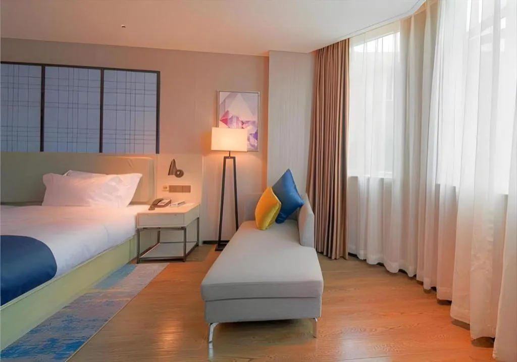 Bed in Echarm Hotel Guangzhou Changlong Shiqiao Metro Station