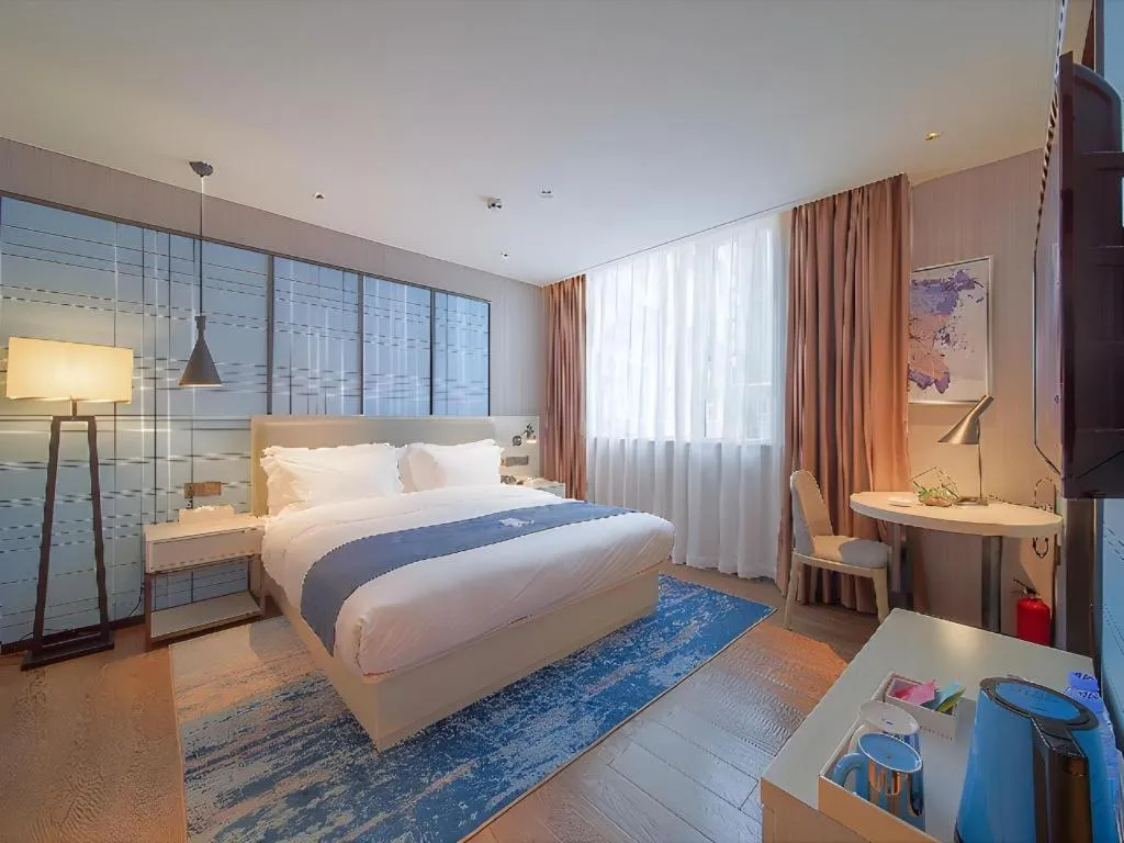 Bed in Echarm Hotel Guangzhou Changlong Shiqiao Metro Station