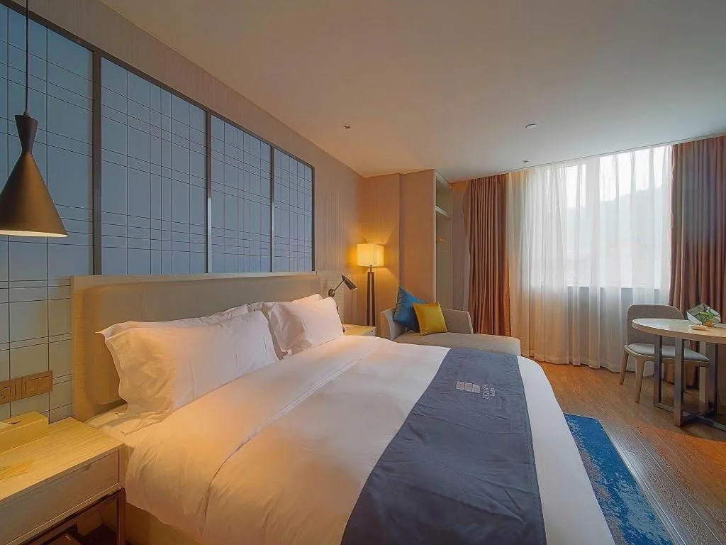 Bed in Echarm Hotel Guangzhou Changlong Shiqiao Metro Station