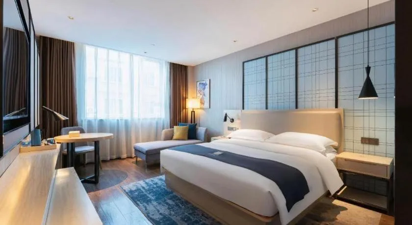 Bed in Echarm Hotel Guangzhou Changlong Shiqiao Metro Station