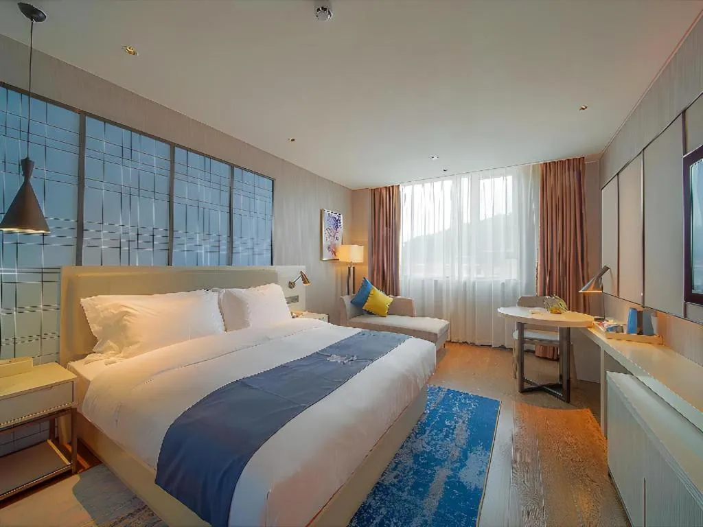 Bed in Echarm Hotel Guangzhou Changlong Shiqiao Metro Station