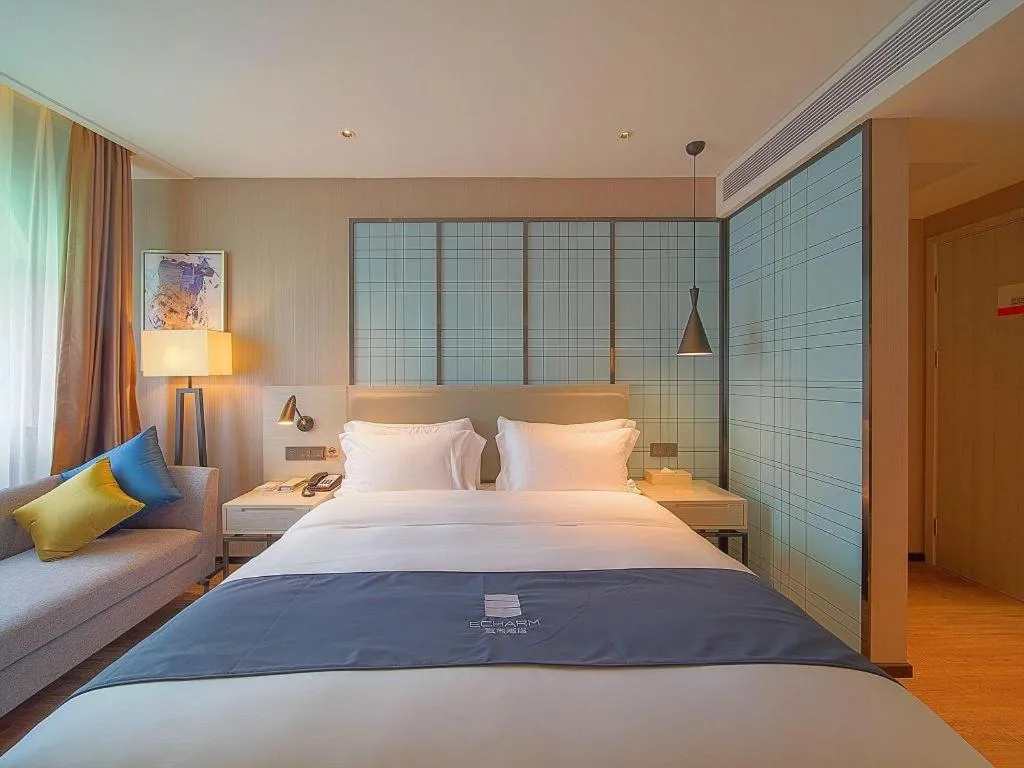 Bed in Echarm Hotel Guangzhou Changlong Shiqiao Metro Station