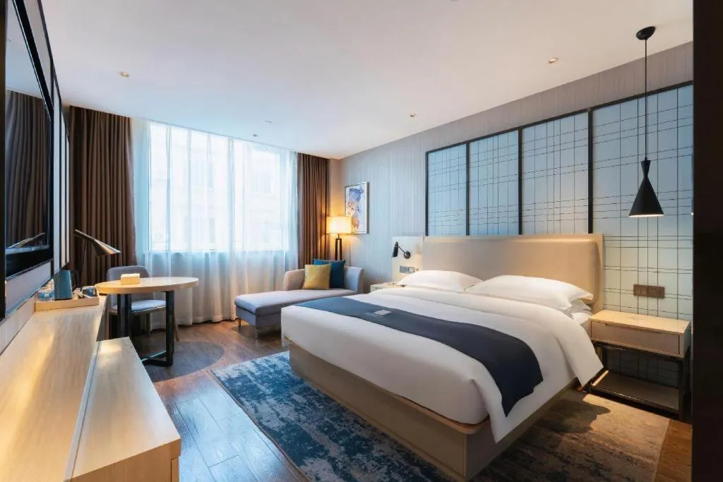 Bed in Echarm Hotel Guangzhou Changlong Shiqiao Metro Station