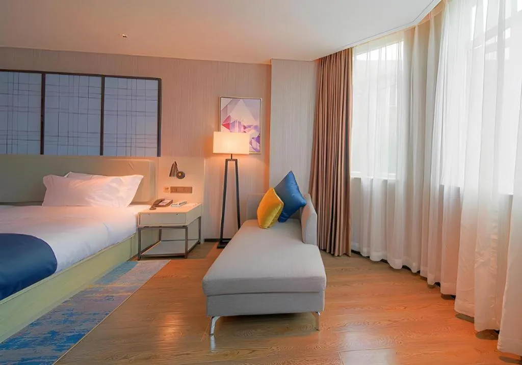 Bed in Echarm Hotel Guangzhou Changlong Shiqiao Metro Station