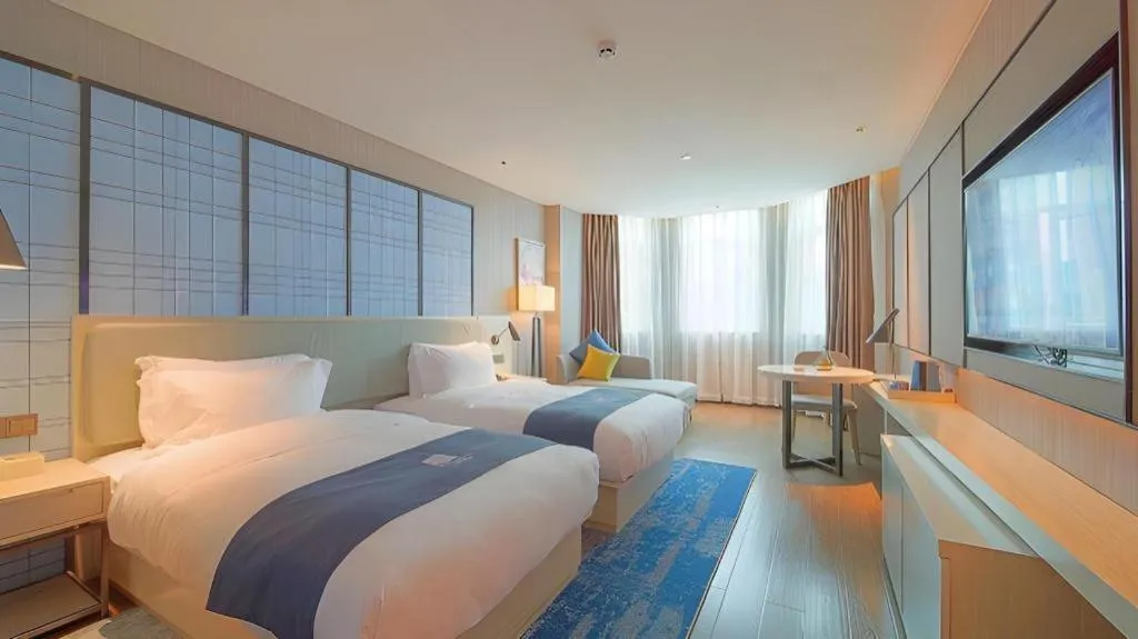 Bed in Echarm Hotel Guangzhou Changlong Shiqiao Metro Station